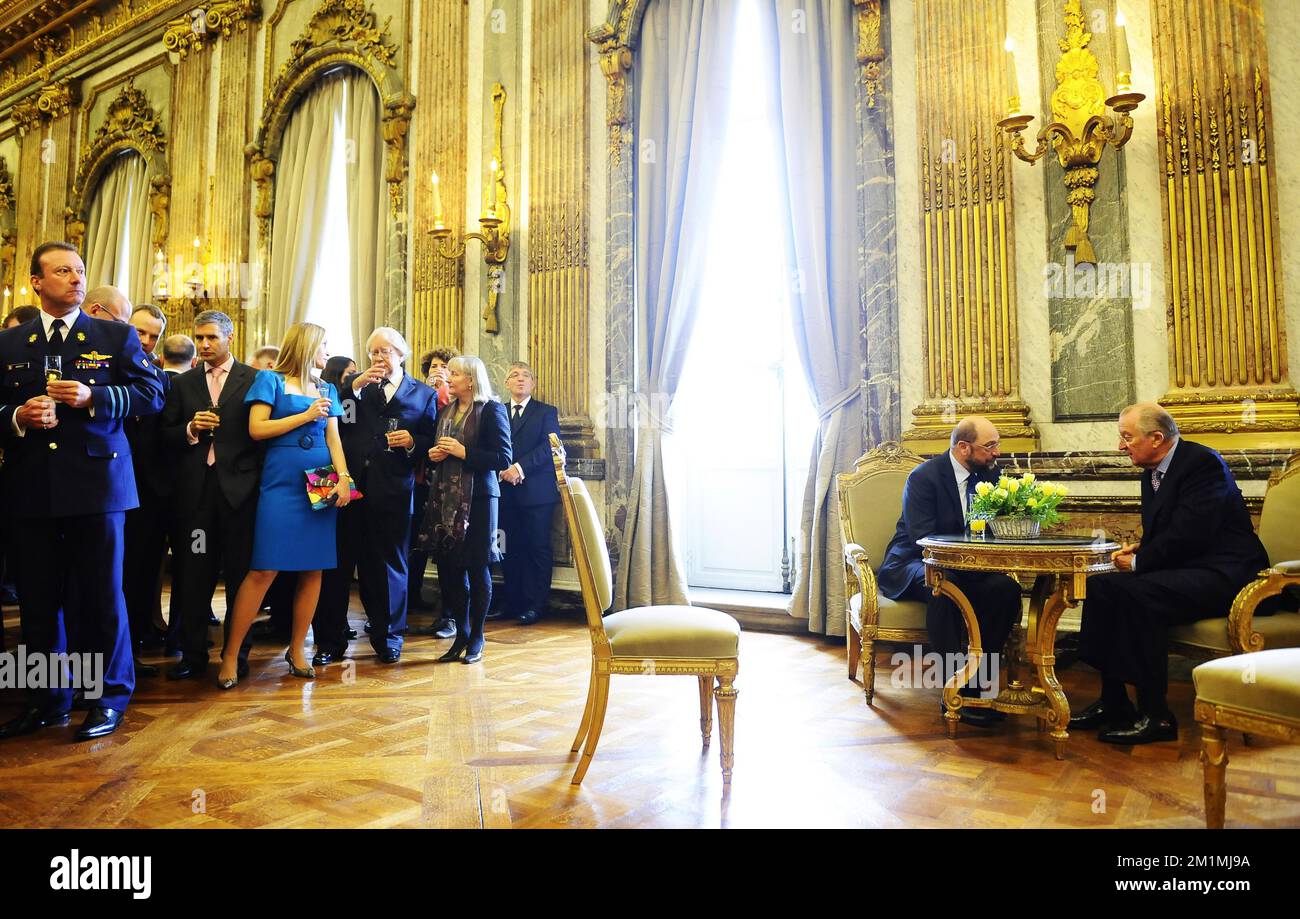 20120125 - BRUSSELS, BELGIUM: King Albert II of Belgium and European Parliament President Martin Schulz talk as the Belgian Royal Family receives the chairmen and presidents of the European institutions, the European Commissioners and other representatives of the European institutions, at the Royal Castle in Laeken/Laken, Brussels, Wednesday 25 January 2012. BELGA PHOTO BENOIT DOPPAGNE Stock Photo