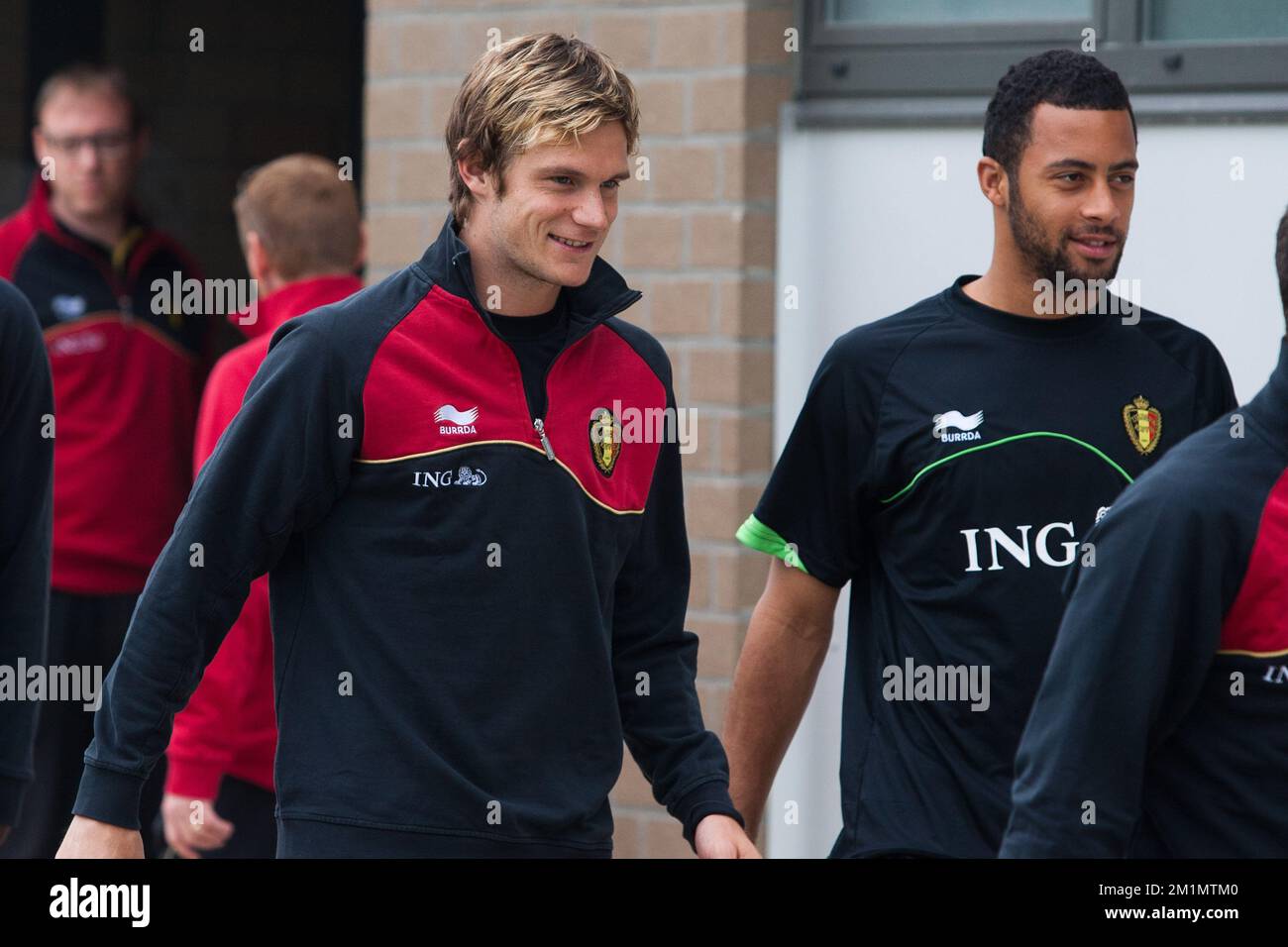 20120530 - ANGLEUR, BELGIUM: Belgium's Guillaume Gillet and Belgium's Moussa Dembele arrive for a training session of the Red Devils, the Belgian national soccer team, Wednesday 30 May 2012 in Angleur. The team is preparing for a friendly game against England next Saturday.  BELGA PHOTO BRUNO FAHY Stock Photo