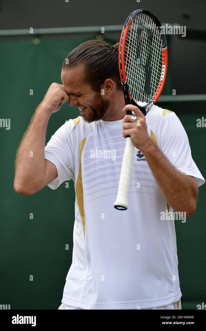 20120628 - LONDON, UNITED KINGDOM: Belgian Xavier Malisse celebrates during the second round match of Belgian Xavier Malisse (ATP 75) against French Gilles Simon (ATP 13) at the men's singles at the 2012 Wimbledon grand slam tennis tournament at the All England Tennis Club, in southwest London, Thursday 28 June 2012. Malisse won in three sets: 6-4, 6-4 and 7-6 (7/5). BELGA PHOTO DIRK WAEM Stock Photo