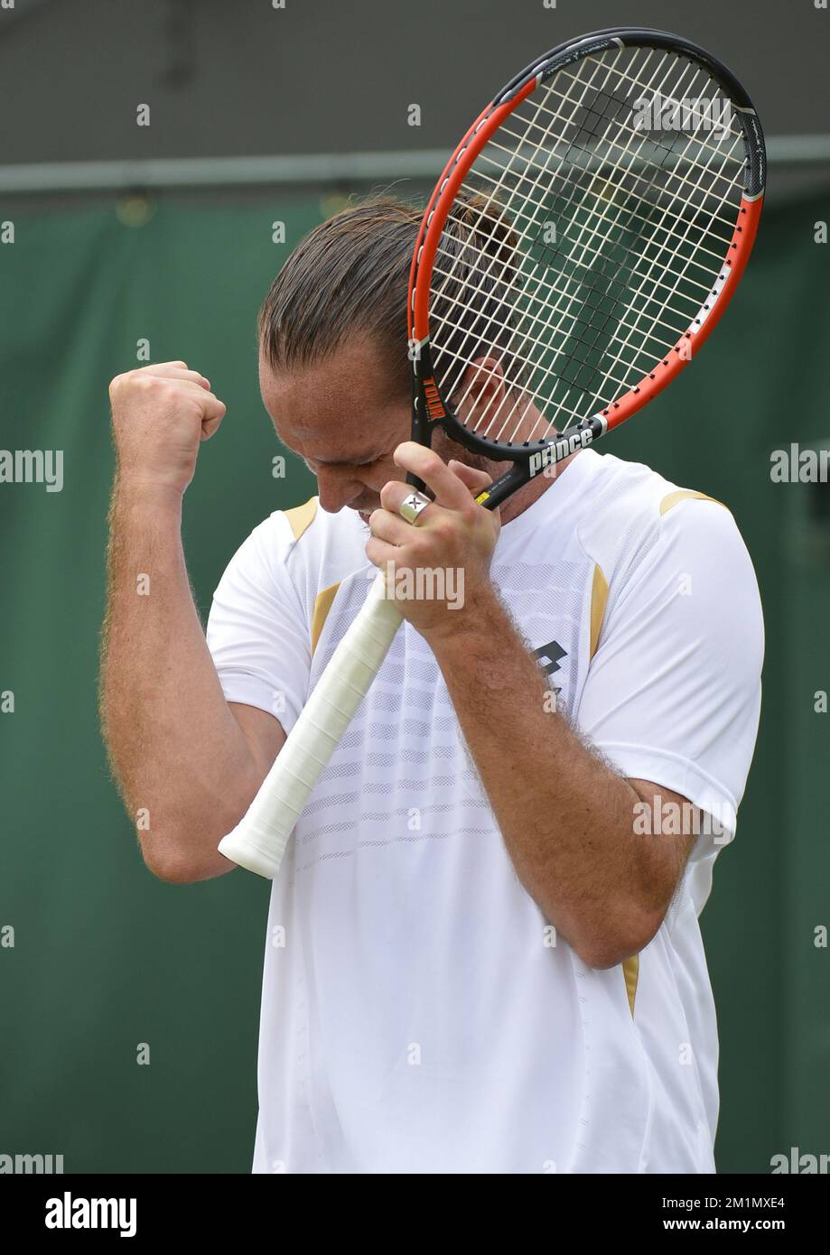 20120628 - LONDON, UNITED KINGDOM: Belgian Xavier Malisse celebrates during the second round match of Belgian Xavier Malisse (ATP 75) against French Gilles Simon (ATP 13) at the men's singles at the 2012 Wimbledon grand slam tennis tournament at the All England Tennis Club, in southwest London, Thursday 28 June 2012. Malisse won in three sets: 6-4, 6-4 and 7-6  (7/5). BELGA PHOTO DIRK WAEM Stock Photo