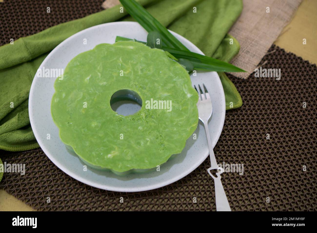 Indonesian Food, Puding Pandan Lumut in a white bowl decorated with ...