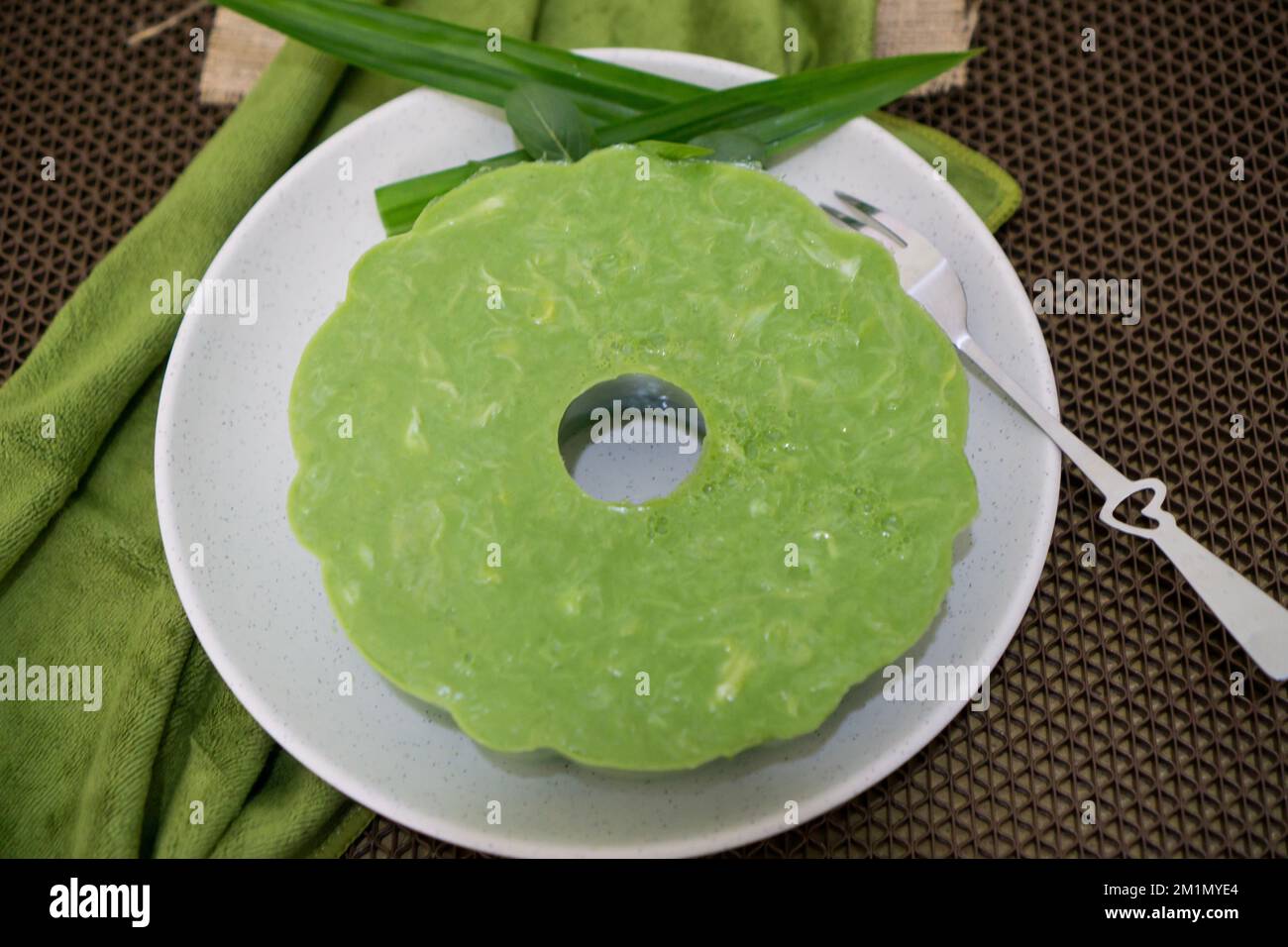 Indonesian Food, Puding Pandan Lumut in a white bowl decorated with ...