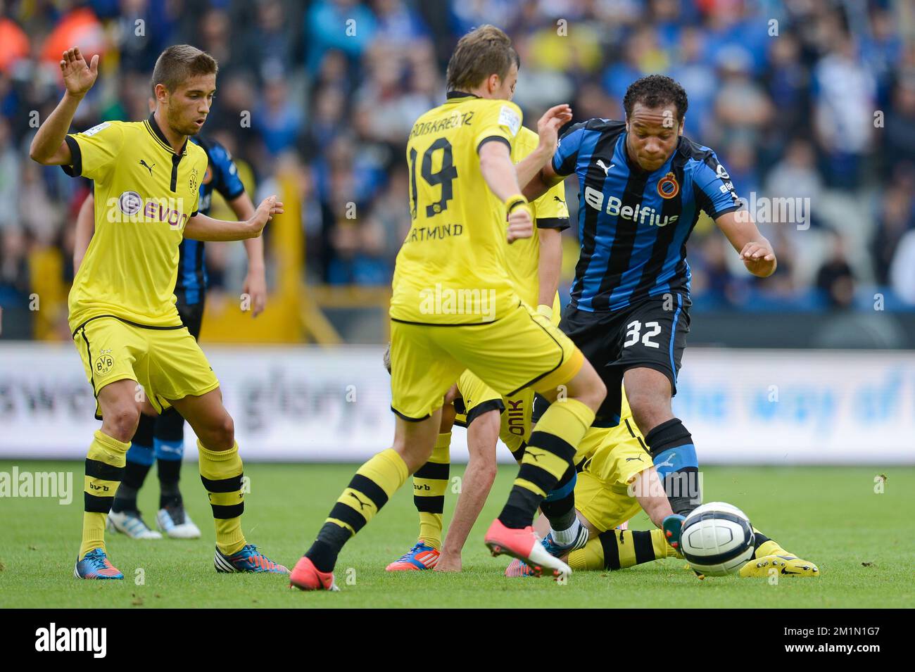 20120714 - BRUGGE, BELGIUM: Borussia's Kevin Grosskreutz and Club's Vadis Odjidja Ofoe fight for the ball during the friendly soccer match Club Brugge vs German champion Borussia Dortmund at the Brugse Metten, in Brugge, Saturday 14 July 2012. BELGA PHOTO BRUNO FAHY Stock Photo
