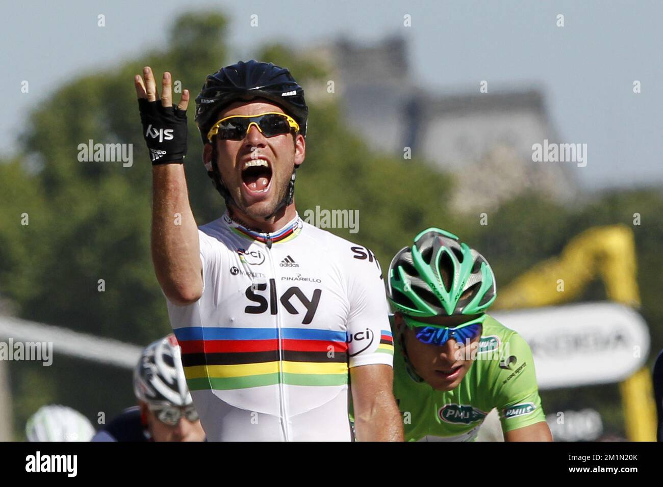 20120722 - PARIS, FRANCE: British Mark Cavendish of Sky Procycling Team celebrates as he crosses the finish line to win the 20th and last stage of the 99th edition of the Tour de France cycling race, 130km from Rambouillet to the Champs-Elysees, Paris, France, Sunday 22 July 2012. BELGA PHOTO KRISTOF VAN ACCOM Stock Photo