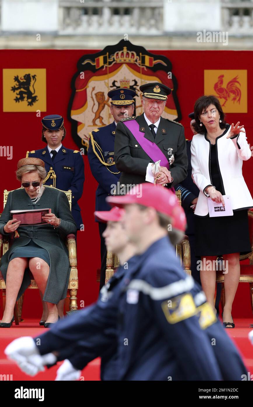 20120721 - BRUSSELS, BELGIUM: Queen Paola of Belgium, King Albert II of Belgium and Vice-Prime Minister and Interior Minister Joelle Milquet (cdH French-speaking christian democrats) pictured during a military parade on the occasion of today's Belgian National Day, Saturday 21 July 2012 in Brussels. BELGA PHOTO NICOLAS MAETERLINCK Stock Photo