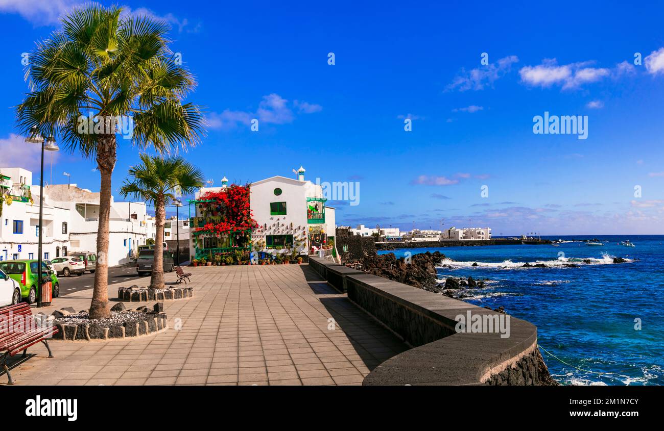 Lanzarote scenic places. view of Punta Mujeres traditional fishing village with crystal sea and white houses. popular  for natural swim pools. Canary Stock Photo