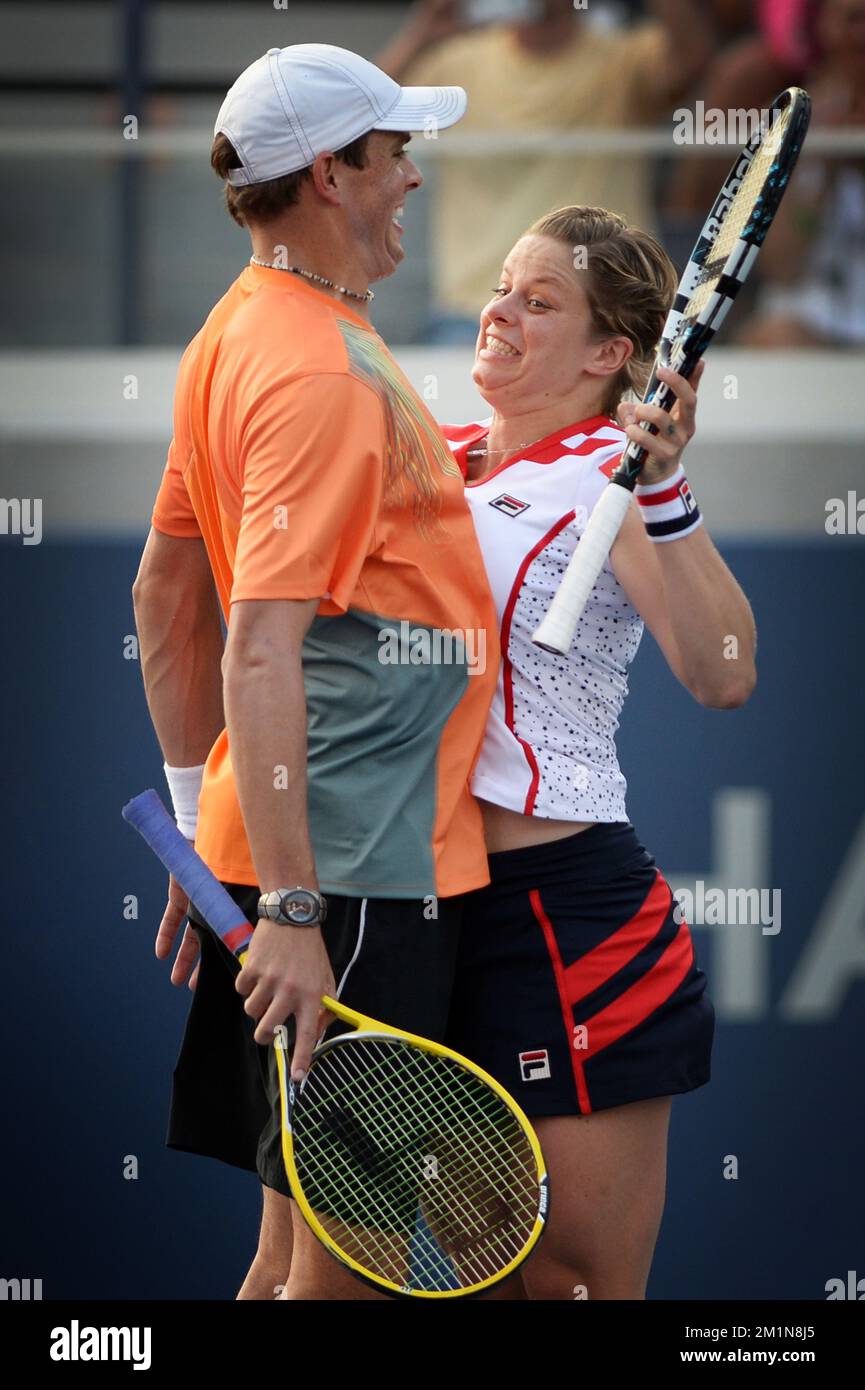 20120831 - NEW YORK, UNITED STATES: American Bob Bryan and Belgian Kim Clijsters celebrate after winning the men's 2nd round match between Steve Darcis and Swiss Stanislas Wawrinka, at the US Open Grand Slam tennis tournament, at Flushing Meadows, in New York City, USA, Friday 31 August 2012. BELGA PHOTO YORICK JANSENS Stock Photo