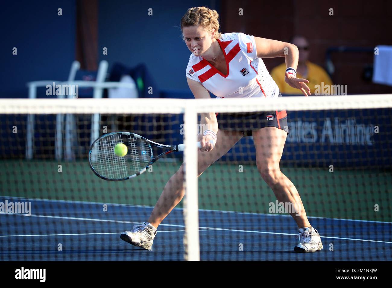 20120831 - NEW YORK, UNITED STATES: Belgian Kim Clijsters pictured during the mixed doubles first round match, Kim Clijsters and Bob Bryan versus Irina Falconi and Steve Johnson, at the US Open Grand Slam tennis tournament, at Flushing Meadows, in New York City, USA, Friday 31 August 2012. BELGA PHOTO YORICK JANSENS Stock Photo