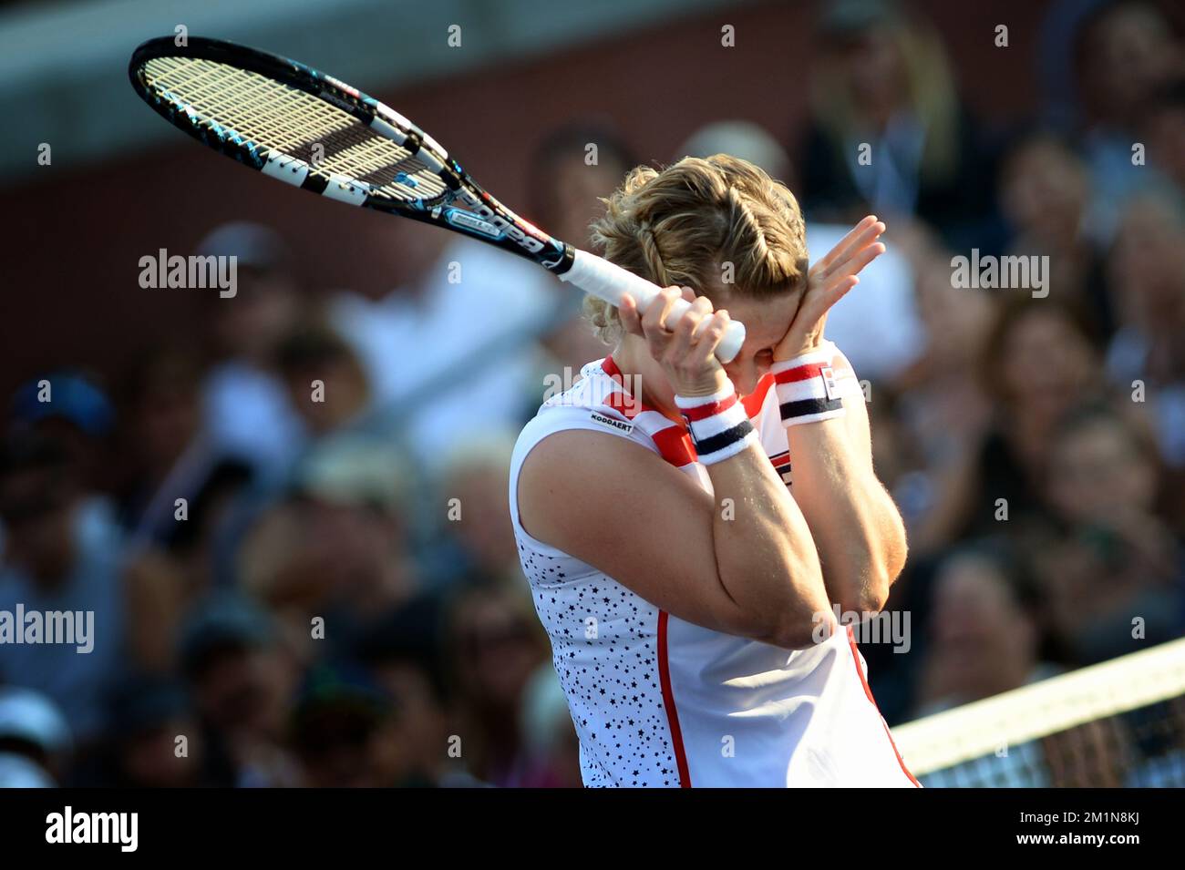 20120831 - NEW YORK, UNITED STATES: Belgian Kim Clijsters pictured during the mixed doubles first round match, Kim Clijsters and Bob Bryan versus Irina Falconi and Steve Johnson, at the US Open Grand Slam tennis tournament, at Flushing Meadows, in New York City, USA, Friday 31 August 2012. BELGA PHOTO YORICK JANSENS Stock Photo