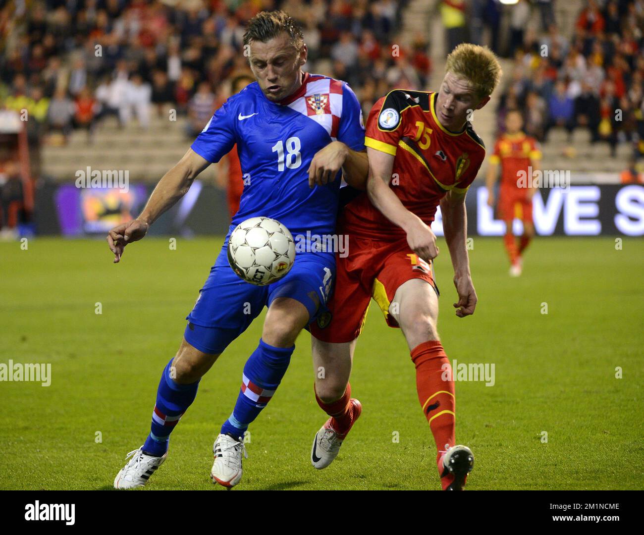 20120911 - BRUSSELS, BELGIUM: Croatian's Ivica Olic and Belgium's Kevin De Bruyne fight for the ball during the qualifying match between Belgium Red Devils and Croatia, Tuesday 11 September 2012 at the King Baudouin stadium, in Brussels. This is the second of ten qualifying games for the 2014 Soccer World Championships. BELGA PHOTO ERIC LALMAND Stock Photo