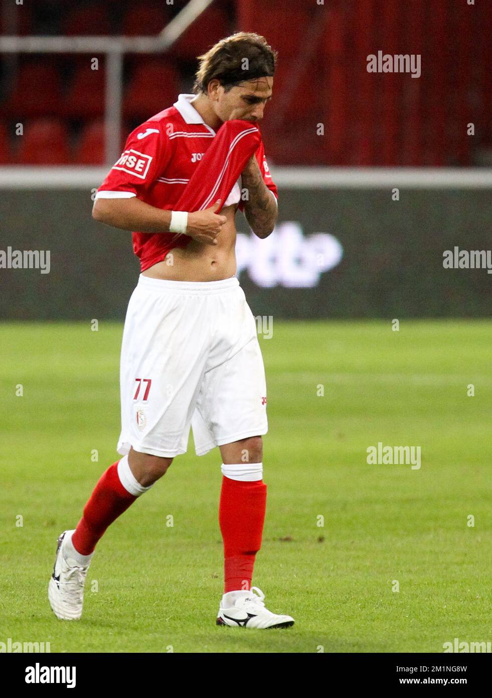 20120921 - LIEGE, BELGIUM: Standard's Maor Bar Buzaglo looks dejected during the Jupiler Pro League match between Standard de Liege and AA Gent, in Liege, Friday 21 September 2012, on the 8th day of the Belgian soccer championship. BELGA PHOTO VIRGINIE LEFOUR Stock Photo