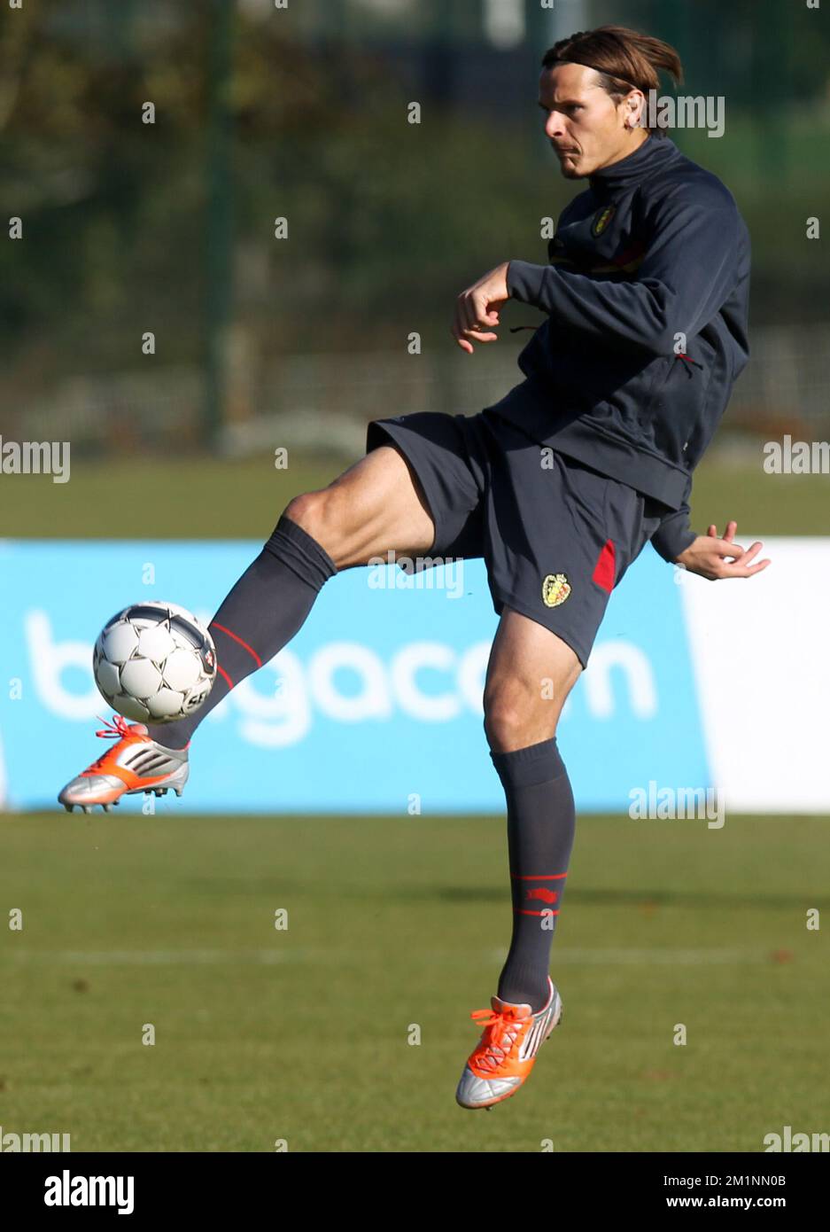 20121014 - BRUSSELS, BELGIUM: Belgium's Daniel Van Buyten pictured during a training session of the Red Devils, the Belgian national soccer team, Sunday 14 October 2012 in Neerpede, Brussels. The team is preparing for a qualifying match for the 2014 Soccer World Championships, against Scotland. BELGA PHOTO VIRGINIE LEFOUR Stock Photo