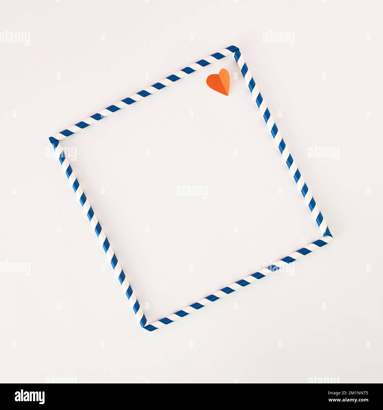 https://c8.alamy.com/comp/2M1NNT5/frame-made-of-paper-straws-and-heart-flat-lay-minimal-valentines-or-love-concept-2M1NNT5.jpg