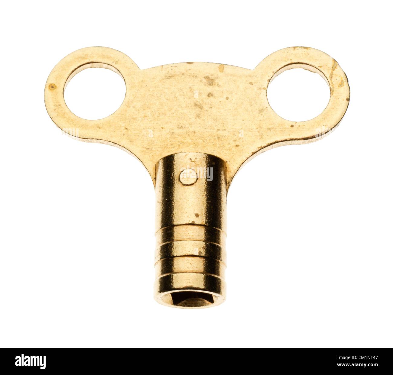 A simple brass metal radiator valve key. A plumbers standard tool in