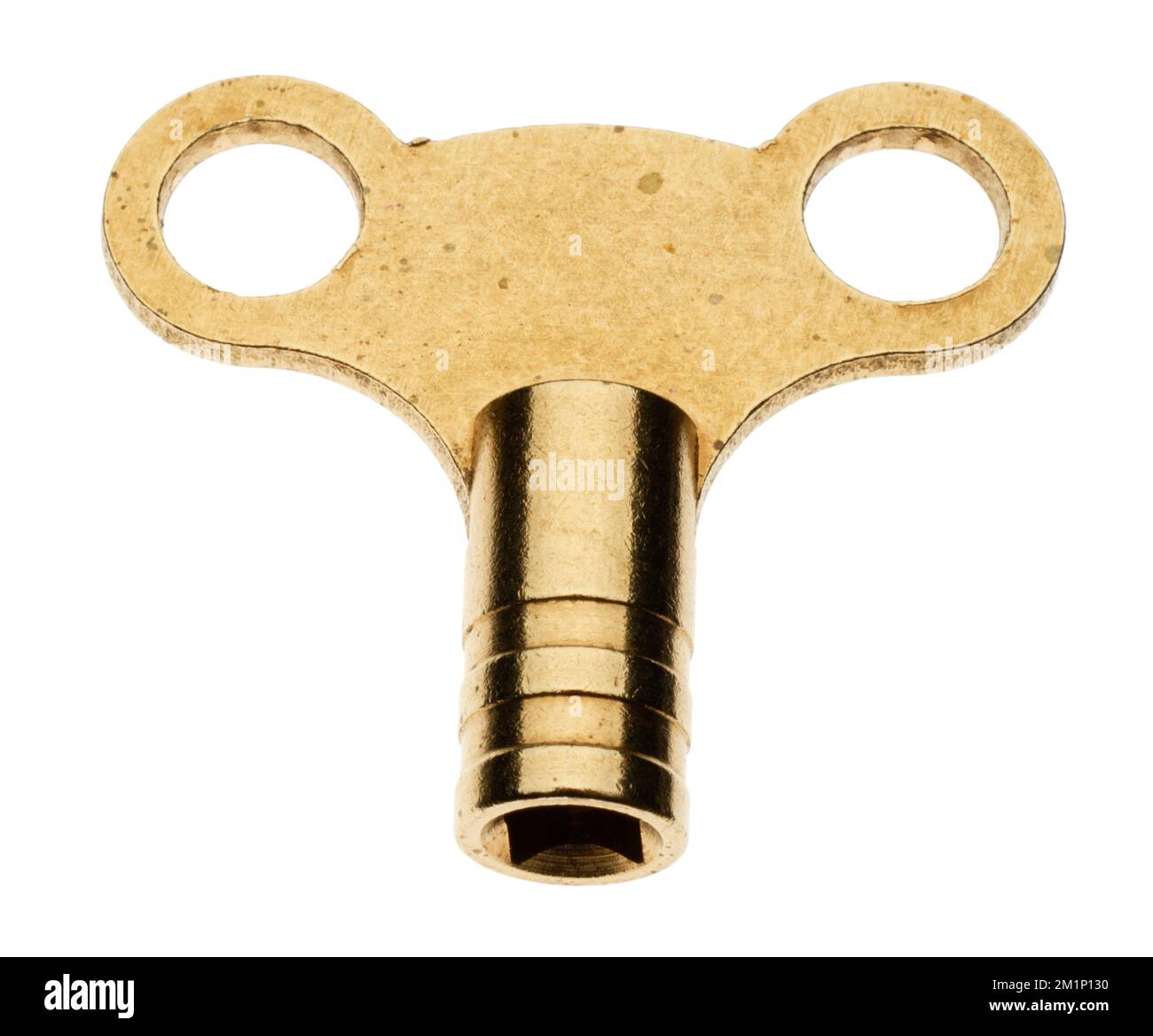 A simple brass metal radiator valve key. A plumbers standard tool in
