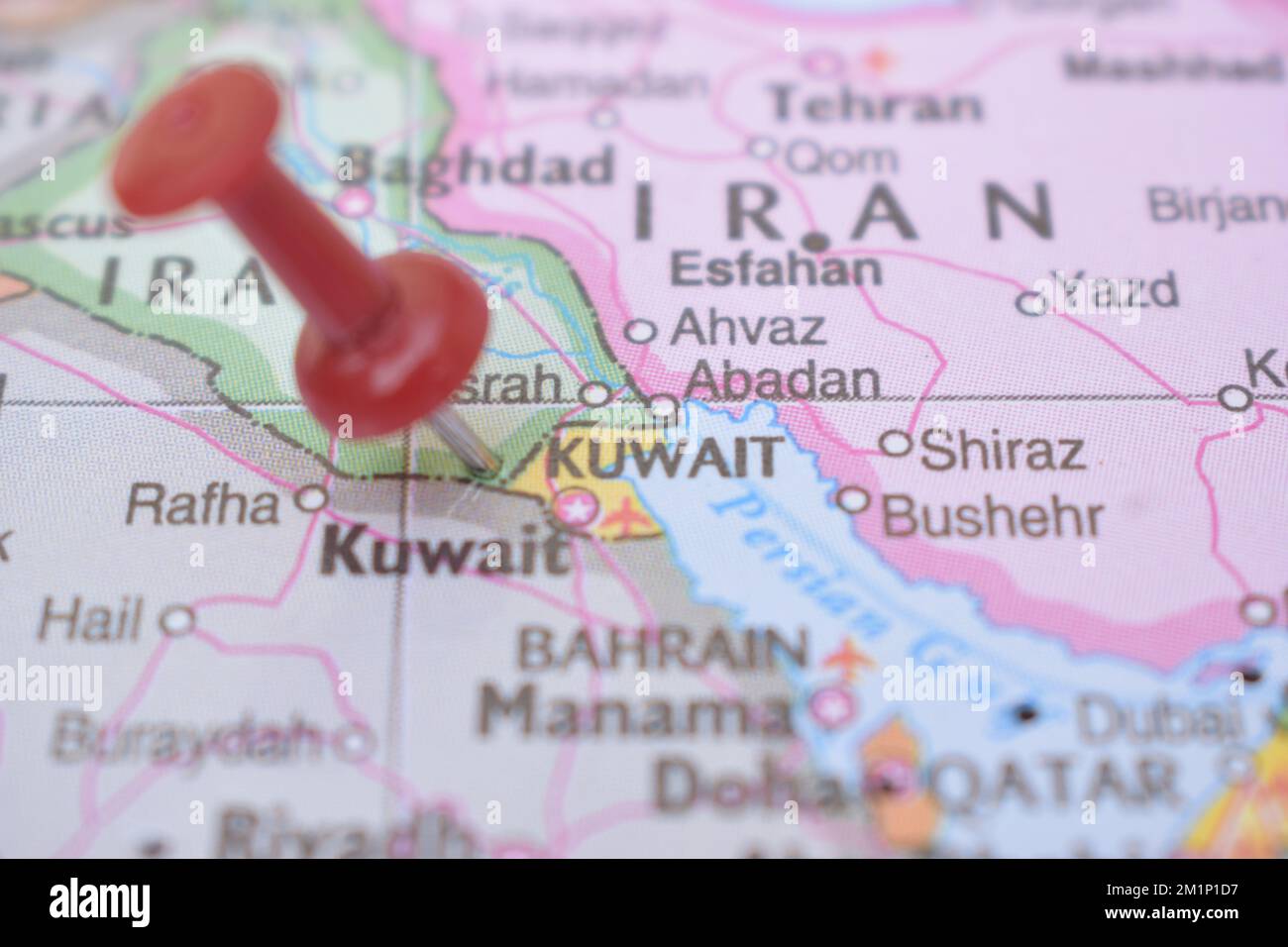 Red Push Pin Pointing On Location Of Kuwait World Map Close Up View Red Push Pin Pointing On Location Of Kuwait World Map Close Up View Stock Photograph 2M1P1D7
