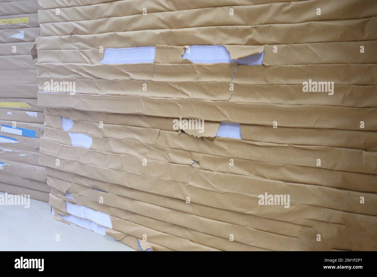 Virgin Colored Paper Ream pile stock on printing press for sell and