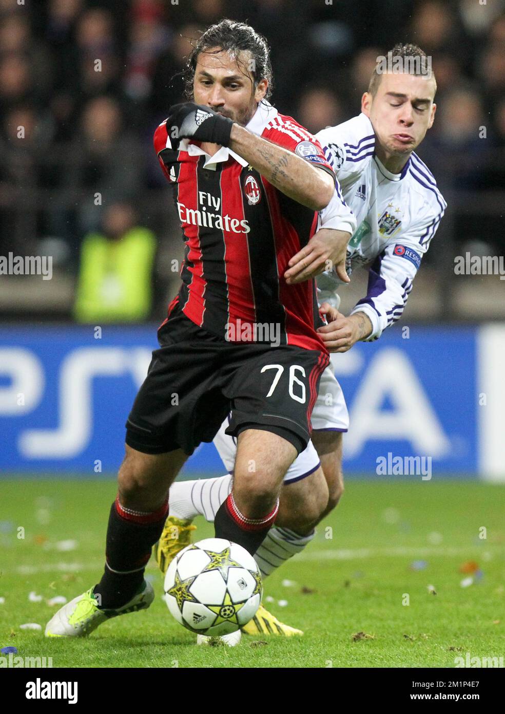 20121121 - BRUSSELS, BELGIUM: Milan's Mario Yepes and Anderlecht's Massimo Bruno fight for the ball during the football game between Belgian RSC Anderlecht and Italian AC Milan, on the fifth day of the group C of Champions League group C Wednesday 21 November 2012 in Brussels.  BELGA PHOTO VIRGINIE LEFOUR Stock Photo