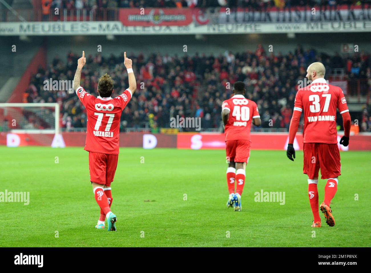 20121207 - LIEGE, BELGIUM: Standard's Maor Bar Buzaglo (L) celebrates after scoring the 3-0 goal during the Jupiler Pro League match between Standard and Charleroi, in Liege, Friday 07 December 2012, on day 19 of the Belgian soccer championship. BELGA PHOTO YORICK JANSENS Stock Photo