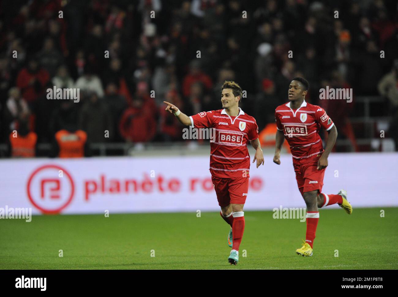20121207 - LIEGE, BELGIUM: Standard's Maor Bar Buzaglo (C) celebrates after scoring the 3-0 goal during the Jupiler Pro League match between Standard and Charleroi, in Liege, Friday 07 December 2012, on day 19 of the Belgian soccer championship. BELGA PHOTO JOHN THYS Stock Photo