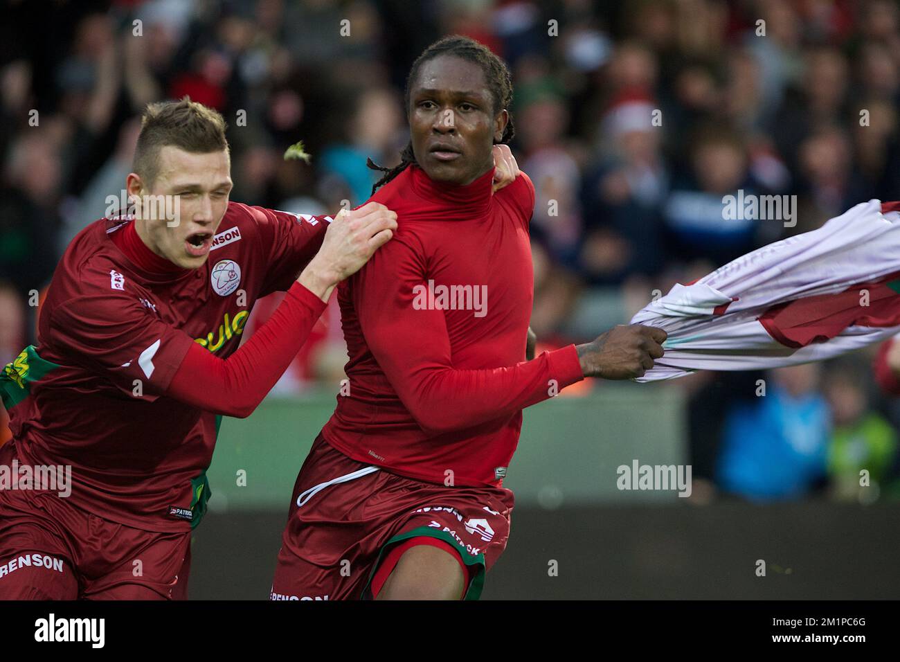 20121226 WAREGEM, BELGIUM Essevee's Habib Habibou celebrates after