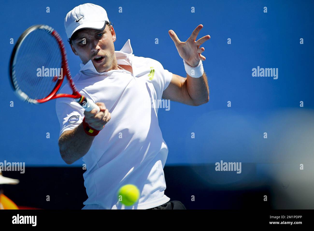 20130115 - MELBOURNE, AUSTRALIA: Belgian Steve Darcis plays a forehand at  the match between Belgian Steve Darcis (ATP 98) and German Philipp  Kohlschreiber (ATP 19), in the first round of the men's