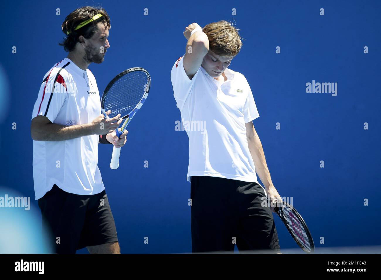 20130116 - MELBOURNE, AUSTRALIA: German Simon Stadler and Belgian David  Goffin pictured during the match between Belgian David Goffin and German  Simon Stadler against Pakistan's Aisam-ul-Haq Qureshi and Dutch Jean-Julien  Rojer, in