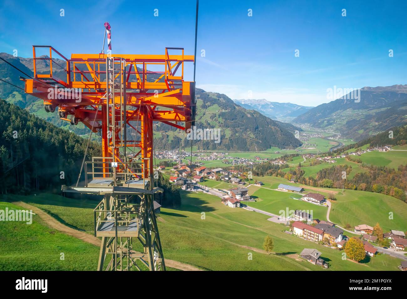 Hainzenberg, Austria - 10.17.2022: Valley of Zillertal with cableway cables. Cableway from Hainzenberg to Bergstation Gerlossteinwand. Beautiful sunny Stock Photo