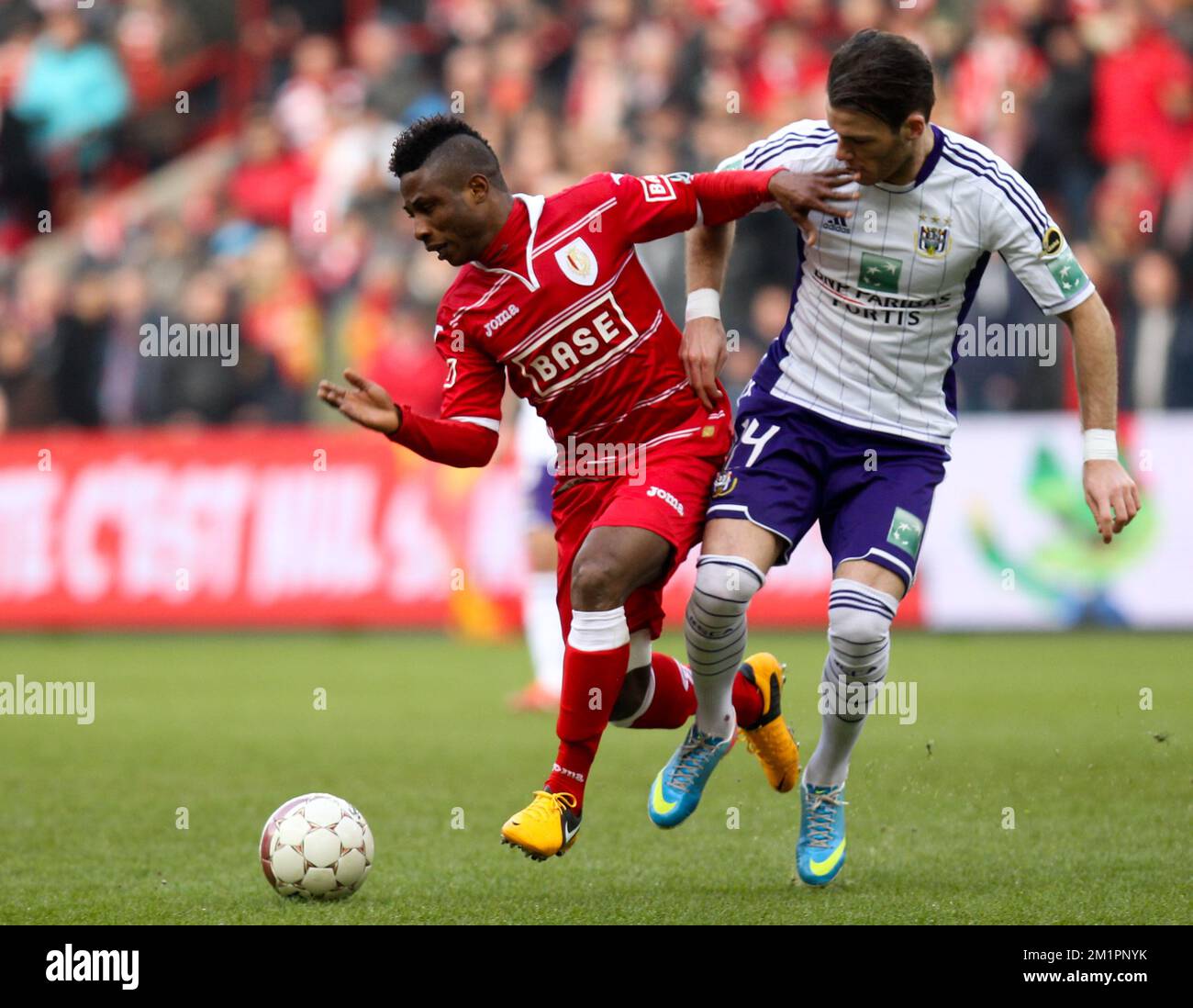 Anderlecht's Bram Nuytinck and Standard's William Vainqueur fight for the  ball during the Jupiler Pro League match of Play-Off 1 between Standard de  Liege and RSC Anderlecht, in Liege Stock Photo 