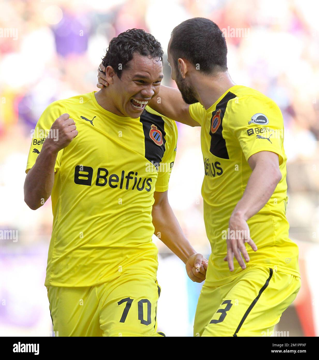 Club's Carlos Bacca and Club's Victor Vazquez Solsona celebrate after scoring during the Jupiler Pro League match of Play-Off 1, between RSC Anderlecht and Club Brugge, in Brussels, Sunday 14 April 2013, on day 3 of the Play-Off 1 of the Belgian soccer championship. BELGA PHOTO VIRGINIE LEFOUR Stock Photo