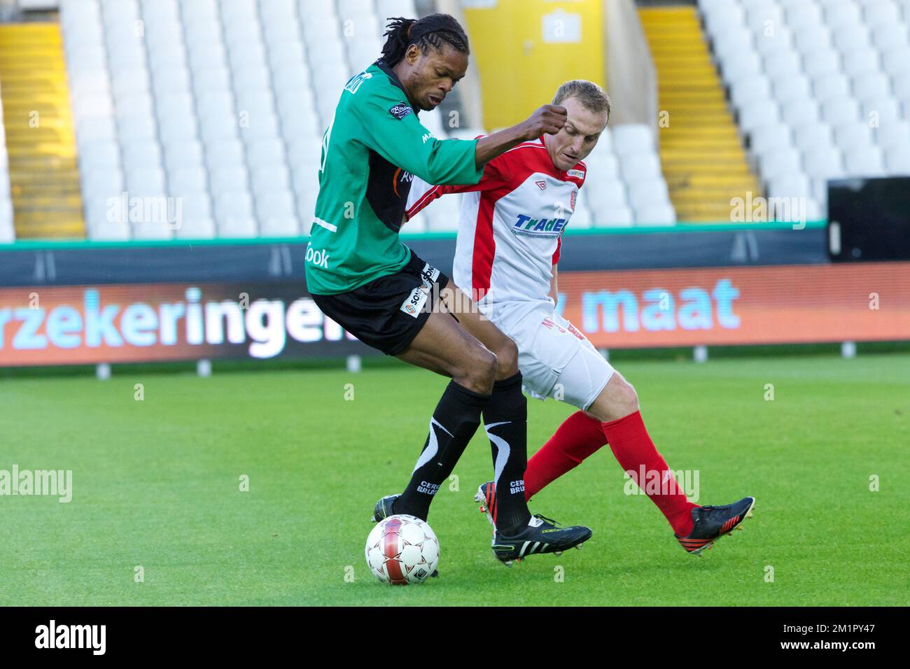 Cercle's Michael Uchebo fights for the ball during the match between Cercle Brugge and Mouscron-Peruwelz, in Brugge, Thursday 23 May 2013, on the fifth day of the final round in the second division league of the Belgian soccer championship. BELGA PHOTO KURT DESPLENTER Stock Photo