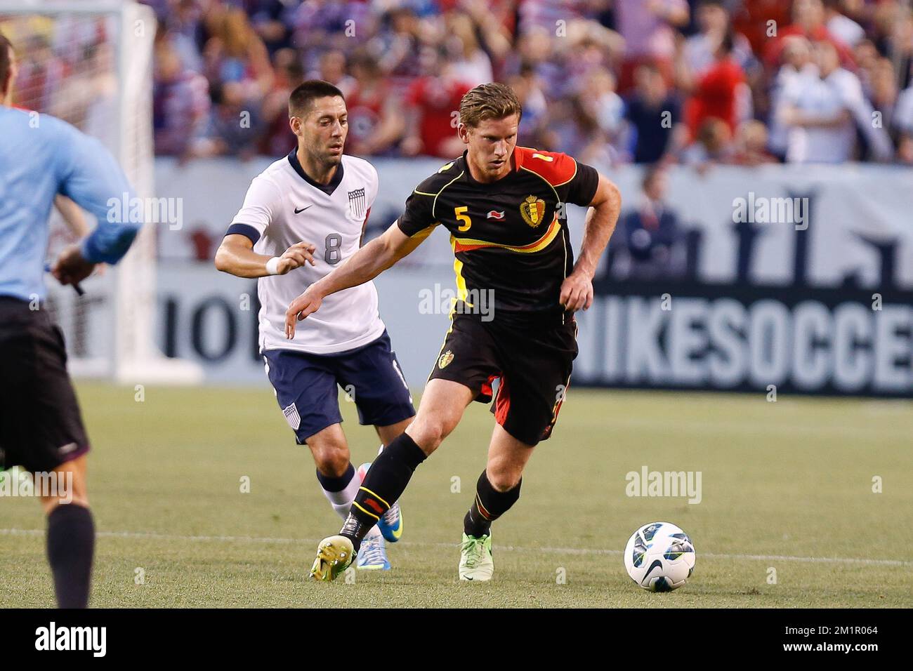 Clint Dempsey and Belgium's Jan Vertonghen fight for the ball during a friendly game of Belgian national team against USA in the FirstEnergyStadium in Cleveland, United States, Wednesday 29 May 2013. Red Devils are preparing for their qualification game for the 2014 FIFA World Cup against Serbia on June 7.  Stock Photo