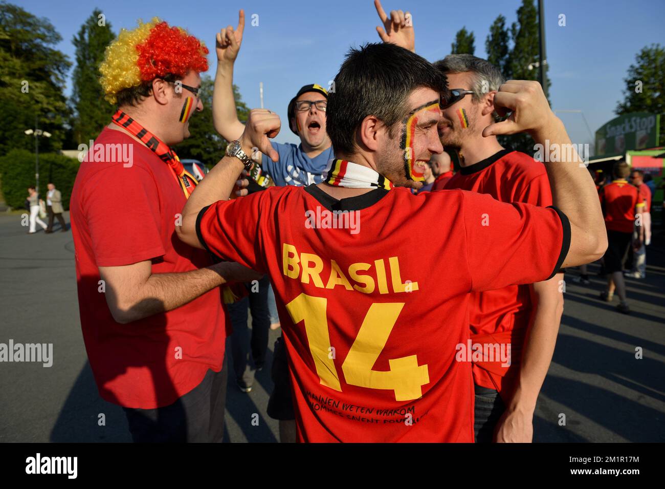 Belgian supporter with a shirt written Brazil, arrive at a match of the Belgian national soccer team 'Red Devils' against the Serbian national soccer team, Friday 07 June 2013 in Brussels. The game is part of the qualifying matches for the 2014 FIFA World Cup.  Stock Photo