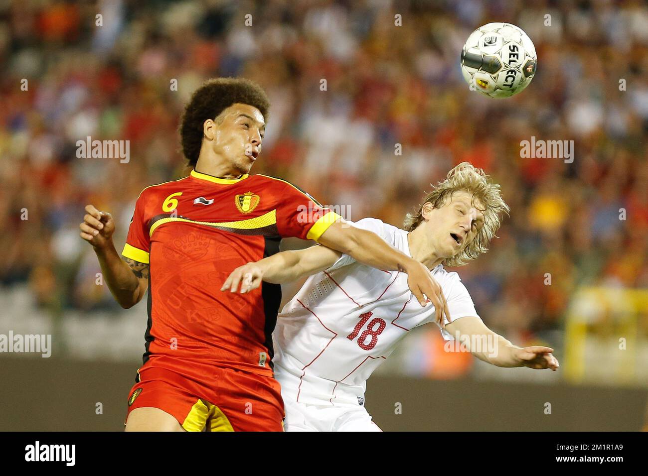 Belgium's Axel Witsel and Serbia's Basta fight for the ball during a match of the Belgian national soccer team 'Red Devils' against the Serbian national soccer team, Friday 07 June 2013 in Brussels. The game is part of the qualifying matches for the 2014 FIFA World Cup.  Stock Photo