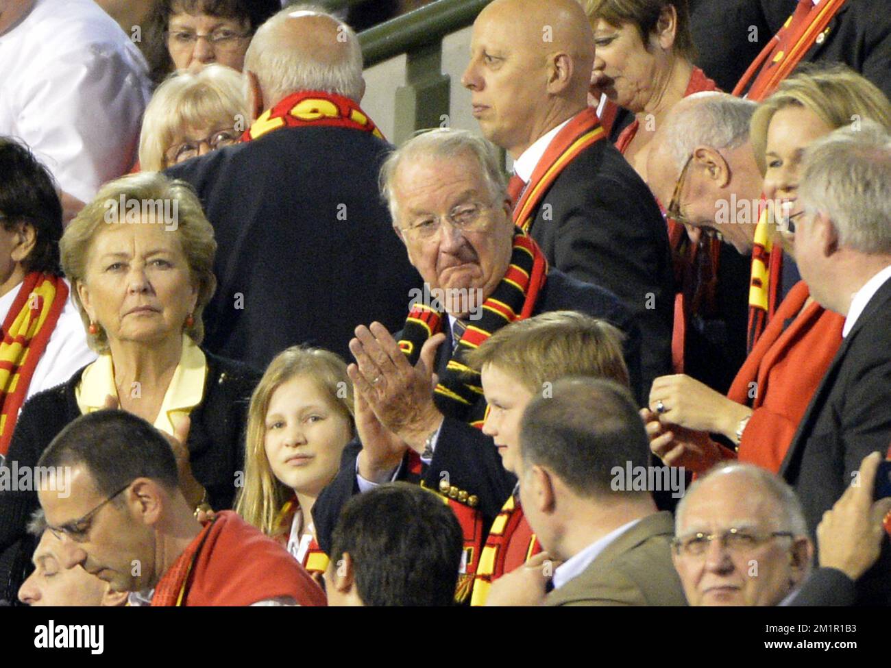 In the stands, Queen Paola of Belgium, Princess Elisabeth, King Albert II of Belgium, Prince Gabriel and Princess Mathilde of Belgium applaud at a match of the Belgian national soccer team 'Red Devils' against the Serbian national soccer team, Friday 07 June 2013 in Brussels. The game is part of the qualifying matches for the 2014 FIFA World Cup.  Stock Photo