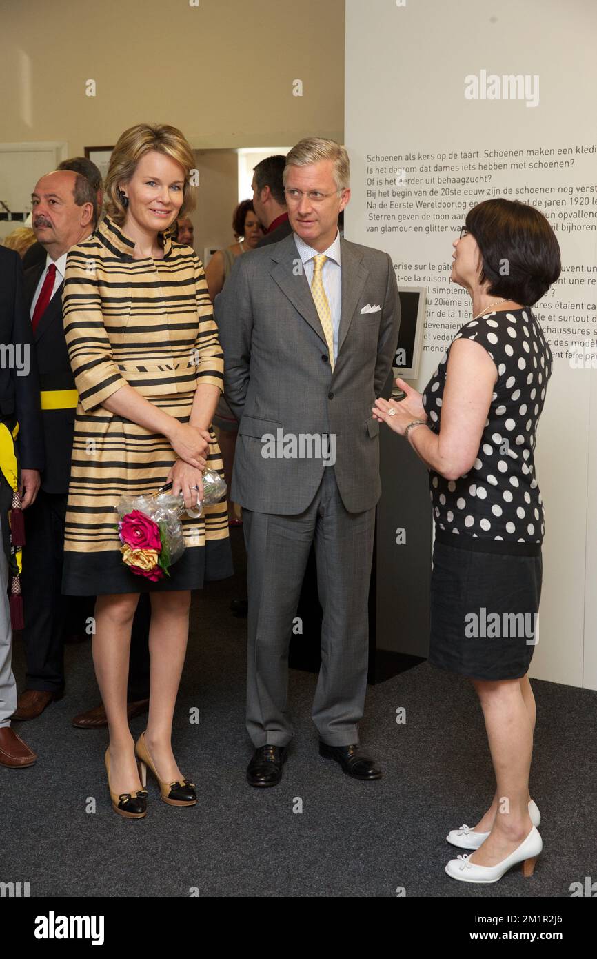 Princess Mathilde of Belgium and Crown Prince Philippe of Belgium pictured  during a royal visit to the 'Schoeiselmuseum' (footwear museum) in Izegem  as a part of a trip to several cities in