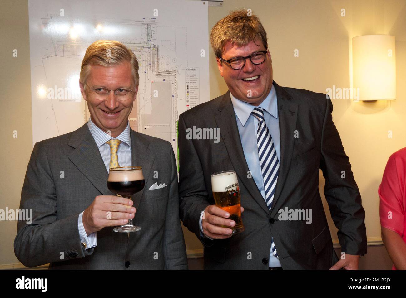 20130620 - INGELMUNSTER, BELGIUM: Crown Prince Philippe of Belgium and  Xavier Van Honsebrouck drink a beer during a royal visit to the 'Brouwerij Van  Honsebrouck' brewery in Ingelmunster as a part of