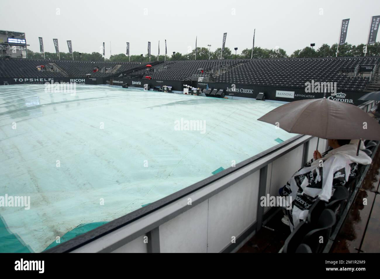 Illustration picture shows spectators with an umbrella at the grandstand before the quarterfinal