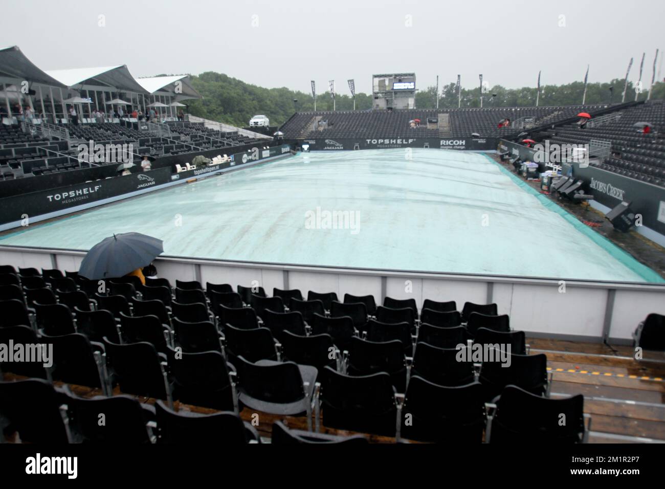 Illustration picture shows spectators with an umbrella at the grandstand before the quarterfinal