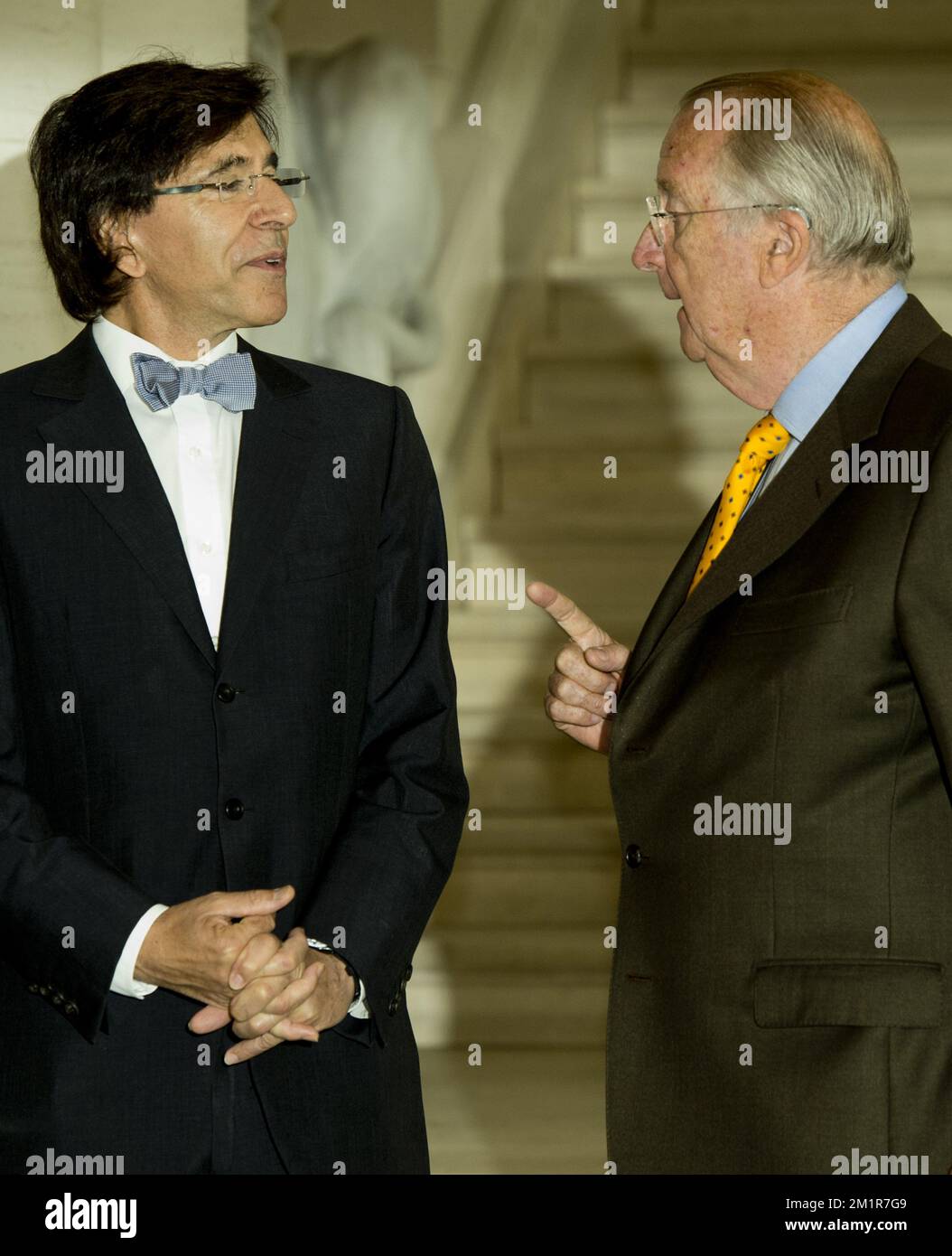 King Albert II of Belgium (R) talks to Belgian Prime Minister Elio Di Rupo during a reception at the royal castle in Laeken - Laken, Brussels for the Minister-Presidents of the regions and communities during the reign of King Albert II of Belgium, Friday 12 July 2013.  Stock Photo