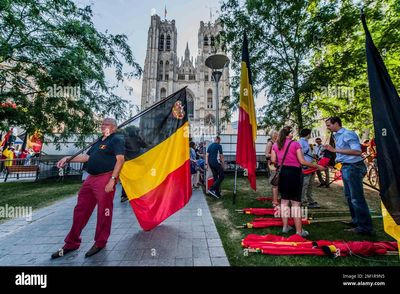 Illustration picture shows royalty fans during celebrations on the Belgian National Day in the city center in Brussels, Sunday 21 July 2013. Today King Albert II abdicated the throne in favour of his son, the new King Philippe - Filip. BELGA PHOTO JONAS ROOSENS Stock Photo