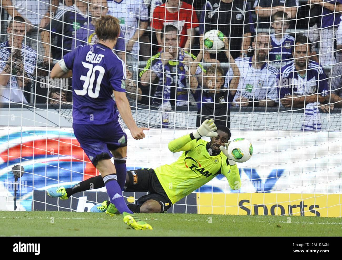 Lokeren's goalkeeper Barry Boubacar Copa stops the ball during the Jupiler Pro League match between RSCA Anderlecht and Sporting Lokeren, in Anderlecht, Sunday 28 July 2013, on the first day of the Belgian soccer championship.  Stock Photo