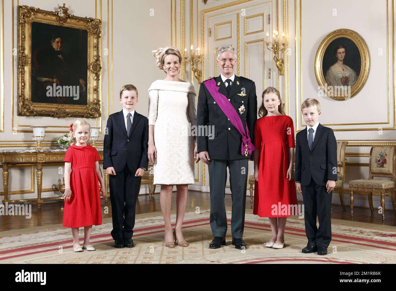 FOR EDITORIAL USE ONLY. NOT FOR SALE FOR MARKETING OR ADVERTISING CAMPAIGNS.  20130721 - BRUSSELS, BELGIUM: L-R, Princess Eleonore, Prince Gabriel, Queen Mathilde of Belgium, King Philippe - Filip of Belgium, Crowd Princess Elisabeth and Prince Emmanuel pose for the official picture at the Royal Palace (Koninklijk Paleis - Palais Royal) in Brussels on the Belgian National Day, Sunday 21 July 2013 in Brussels. Today King Albert II abdicated the throne in favour of his son, the new King Philippe - Filip. Stock Photo