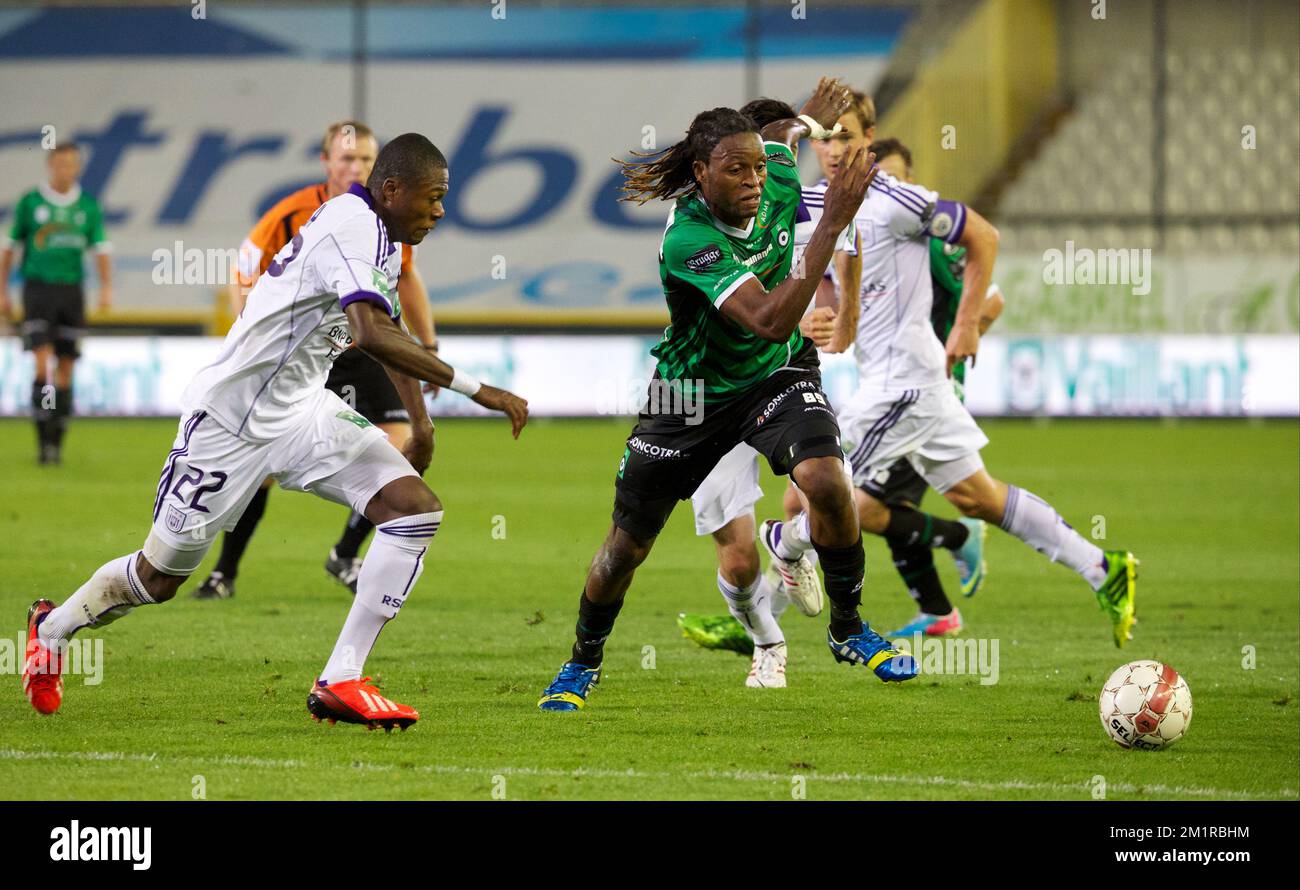 Anderlecht's Chanel Mbemba Mangulu, Cercle's Michael Uchebo and Anderlecht's Sacha Kljestan fight for the ball during the Jupiler Pro League match between Cercle Brugge KSV and RSC Anderlecht, in Brugge, Friday 02 August 2013, on day 2 of the Belgian soccer championship.  Stock Photo