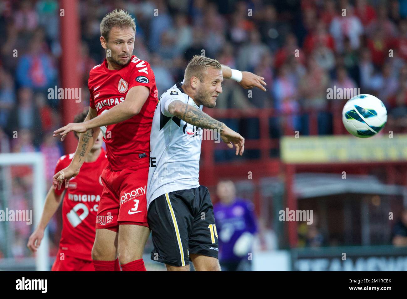 Kortrijk's Baptiste Martin and Lokeren's Jordan Remacle fight for the ...