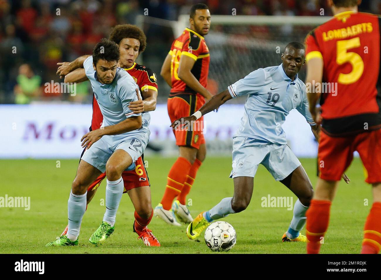 French Clement Grenier and Belgium's Axel Witsel fight for the ball during a friendly game of the Belgian national soccer team Red Devils against France's national soccer team, Wednesday 14 August 2013, in the King Baudouin Stadium (Stade Roi Baudouin/Koning Boudewijnstadion), in Brussels.  Stock Photo