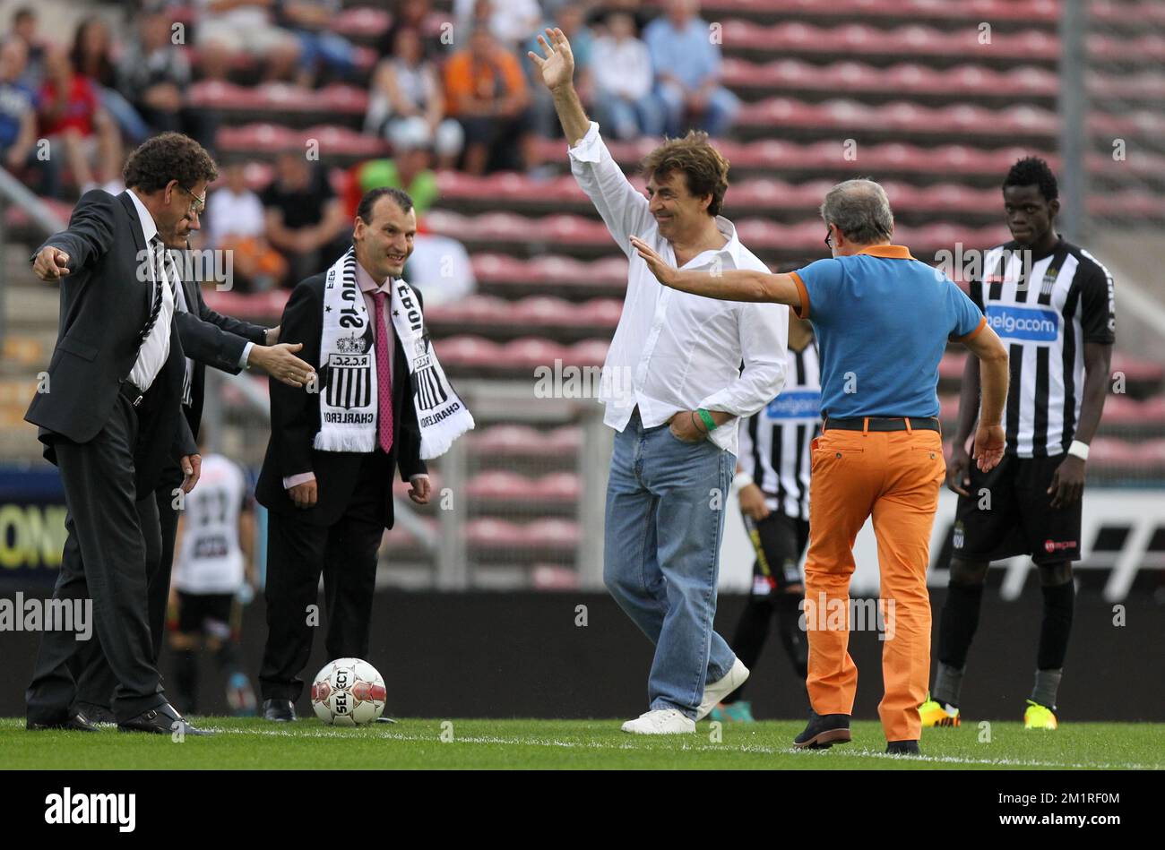 Singer Claude Barzotti pictured at the start of the Jupiler Pro League match between Charleroi and KV Kortrijk, in Charleroi, Saturday 17 August 2013, on day 04 of the Belgian soccer championship.  Stock Photo