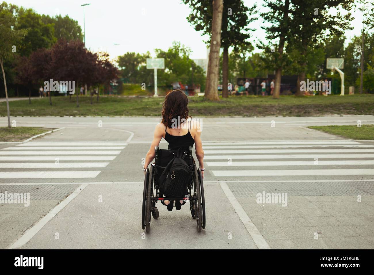 Woman in wheelchair hi-res stock photography and images - Alamy