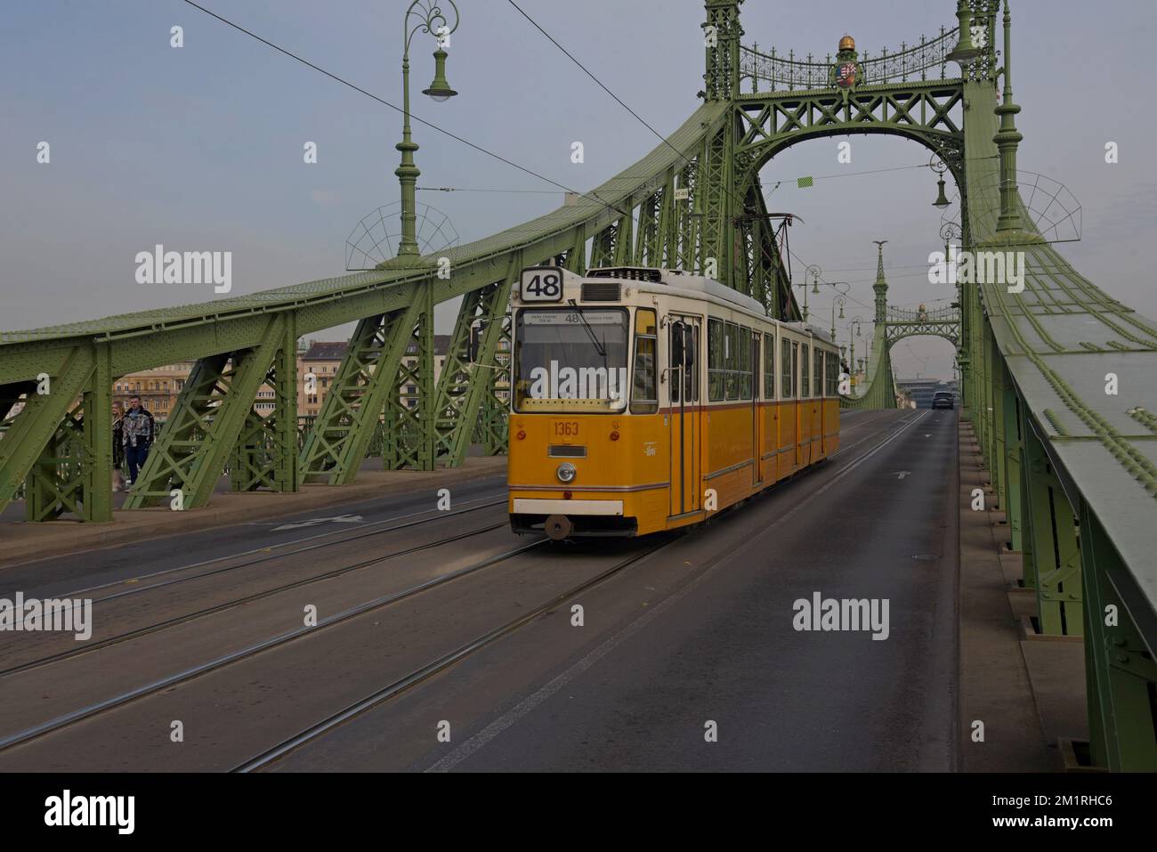 An ICS tram crossing the Liberty Bridge, Budapest, Hungary - Stock Image