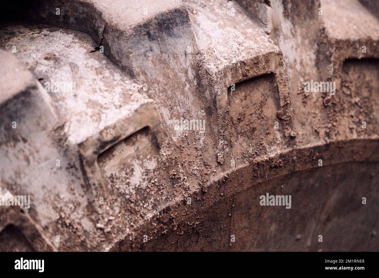 close up of a muddy large vehicle tire Stock Photo